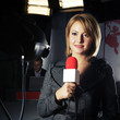 television news reporter in live transmission