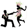 Silhouette of dancing couple with flowers