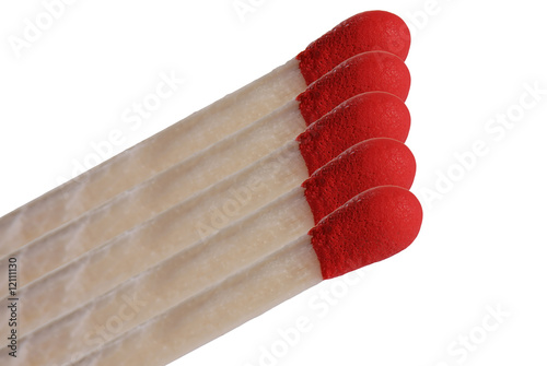Photo: Matches in close-up isolated on white background Matches in close-up isolated on white background