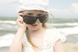 Little girl and big sunglasses II