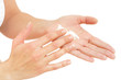 Woman in underwear applies cream on dry hands Woman in underwear applies cream on dry hands