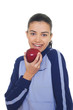 Portrait of smiling young woman holding apple