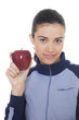 Portrait of smiling young woman holding apple