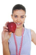 young woman holding red apple and measuring tape