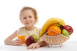 Little girl with juice and fruit