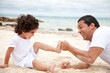 Man and son at the beach