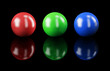 Set of balls isolated on black: RGB colors