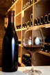 glass and wine in a old cellar glass and wine in a old cellar