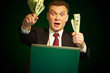 man with money in hands at the monitor
