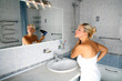 girl in bathroom with drier