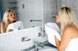girl in bathroom with towel