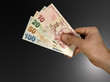 Photo: Turkish lira in hand Turkish lira in hand