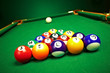 billiard balls on green cloth billiard balls on green cloth