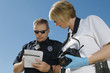 Police Officer and Investigator with Camera