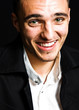 Laugh of amused happy young man