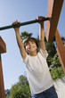 Little Boy on a Jungle Gym