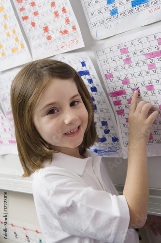 Photo: School Pointing to a Date on a Schedule School Pointing to a Date on a Schedule