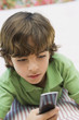 Young Boy Using Cell Phone