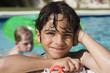 Boy at Edge of Swimming Pool