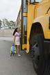 Elementary Student Getting onto School Bus