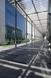 Photo: uae, dubai, architectural detail of a long outdoor hallway at the dubai international financial centre uae, dubai, architectural detail of a long outdoor hallway at the dubai international financial centre