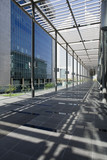 Photo: uae, dubai, architectural detail of a long outdoor hallway at the dubai international financial centre uae, dubai, architectural detail of a long outdoor hallway at the dubai international financial centre