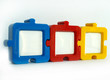 trois cadres en forme de puzzle