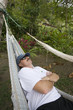 Asleep in a hammock