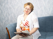 The mature woman with phone