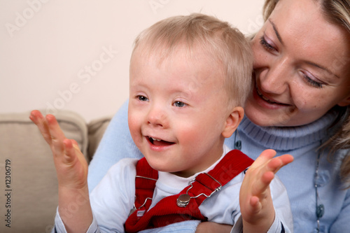 Photo: Mother hold handicapped boy Mother hold handicapped boy