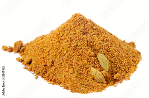 Photo: spices - pile of chicken curry over white spices - pile of chicken curry over white