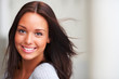 Closeup portrait of beautiful young female isolated over white b
