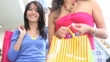 Shopping women on scalators
