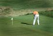 golfer on the practic green golfer on the practic green