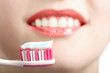toothbrush and white smile. focus on toothbrush