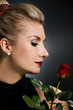 Charming lady with red rose