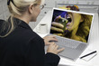 Woman In Kitchen Using Laptop - Entertainment
