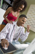 Couple Using Computer