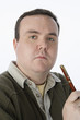 Portrait of mid-adult man holding pen