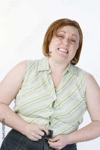 Photo: Studio portrait of overweight woman Studio portrait of overweight woman