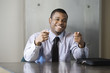 Portrait of a business man gesturing.