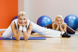 Group of people doing stretching exercise Group of people doing stretching exercise
