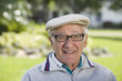 Photo: Portrait of a senior man smiling. Portrait of a senior man smiling.