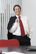 Foto: Portrait of a business man smiling. Portrait of a business man smiling.