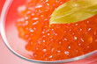 red caviar with green leaf
