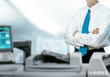 Businessman With Printer In Modern Office