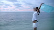 Woman feeling the wind