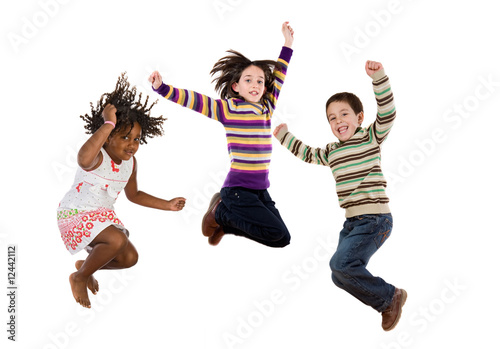 Photo: Three happy children jumping at once Three happy children jumping at once