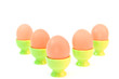 eggs in eggcups isolated on white. easter