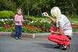 Photo: a young woman photographed his little son a young woman photographed his little son